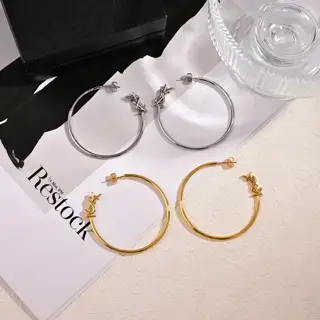 Yves Saint Laurent letter earrings