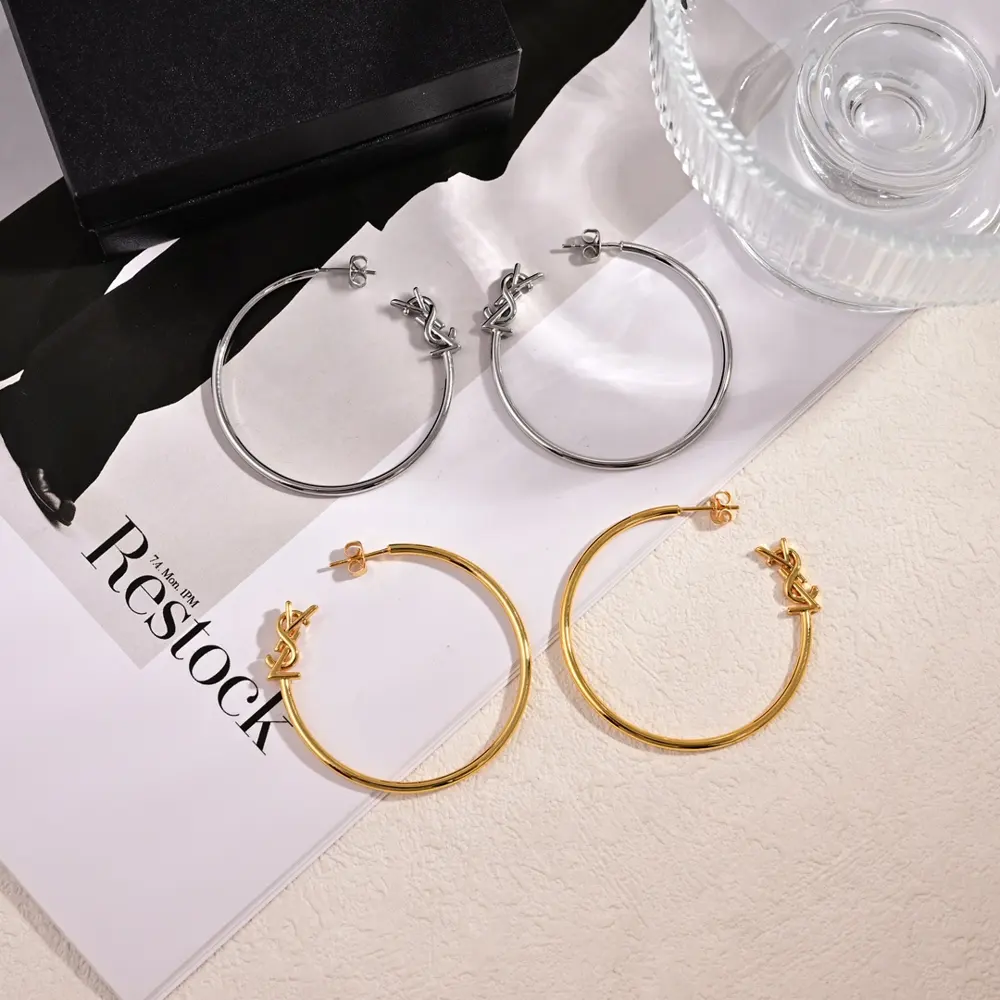 Yves Saint Laurent letter earrings