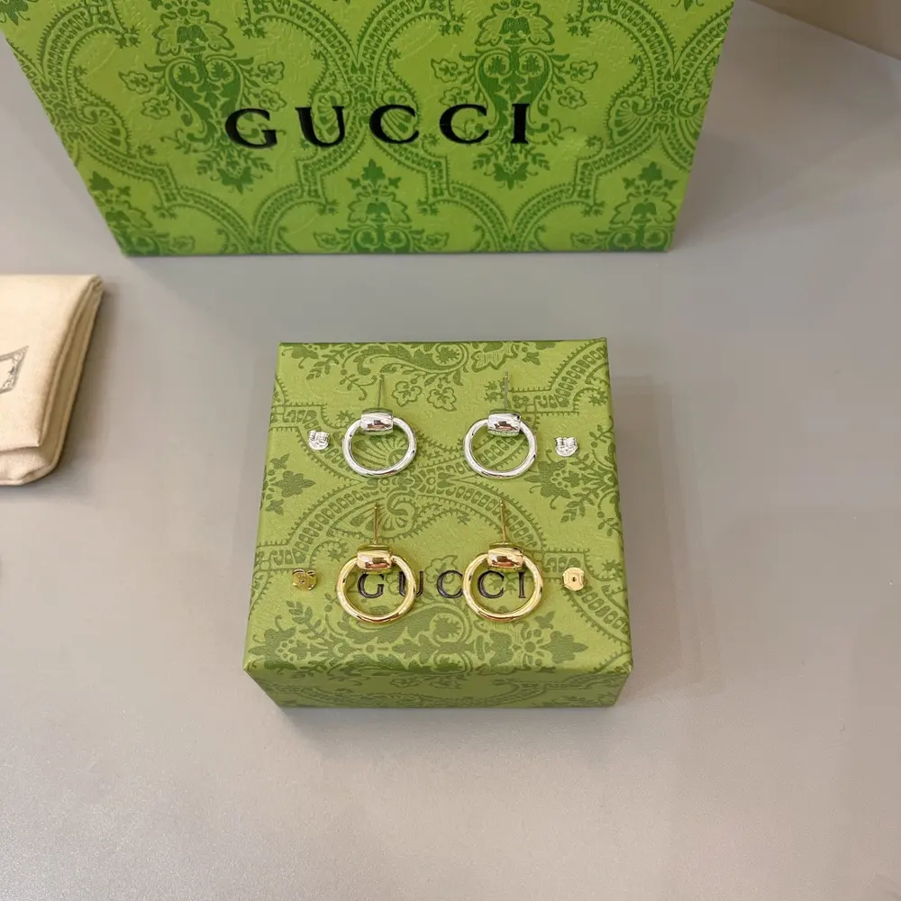 Gucci Women’s Logo Embossed Earrings