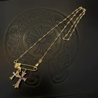 Chrome Hearts classic gold necklace with diamond cross pendant