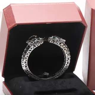 Cartier bright gold double-headed leopard version domineering leopard bracelet. Panthère de