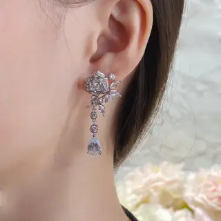 PIAGET’s rose drop earrings have three-dimensional flowers and a perfect blooming shape