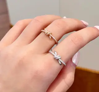 Tiffany half circle diamond knot ring