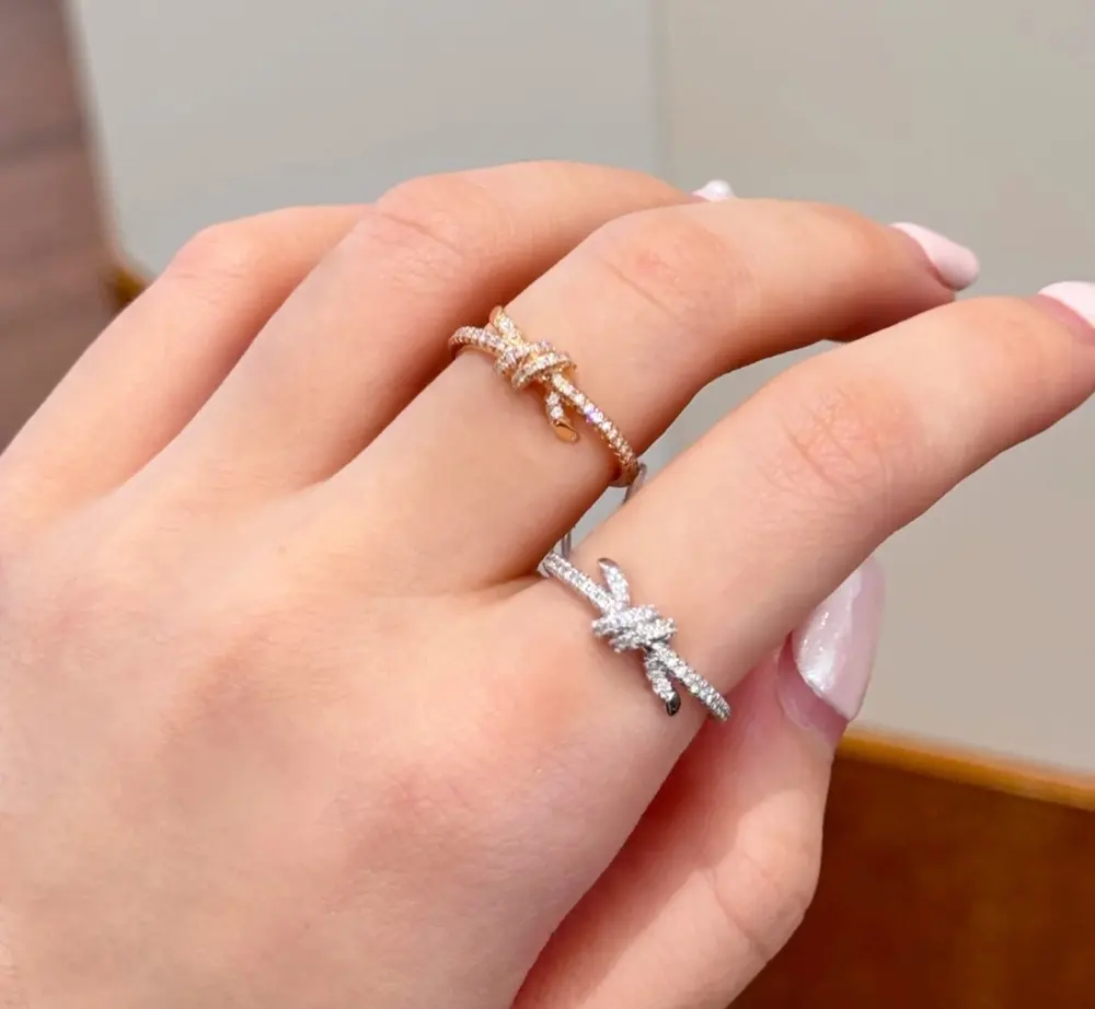 Tiffany half circle diamond knot ring