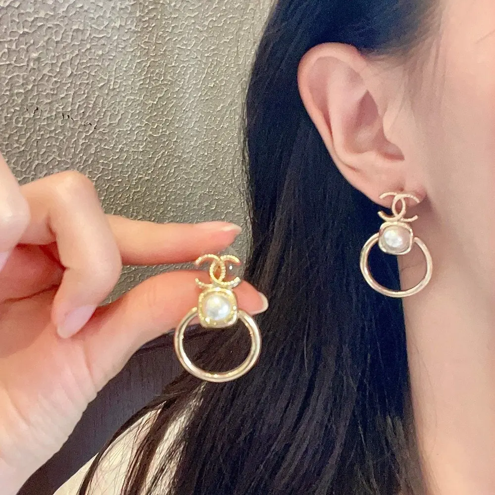 Chanel vintage letter earrings