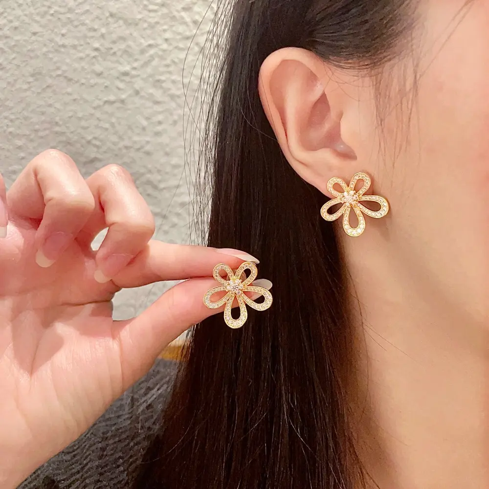 Van Cleef & Arpels diamond-set four-leaf clover earrings