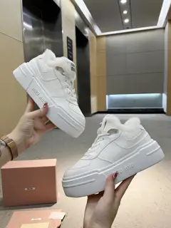 Miu Miu Miu women’s cowhide leather bleached and distressed sneakers