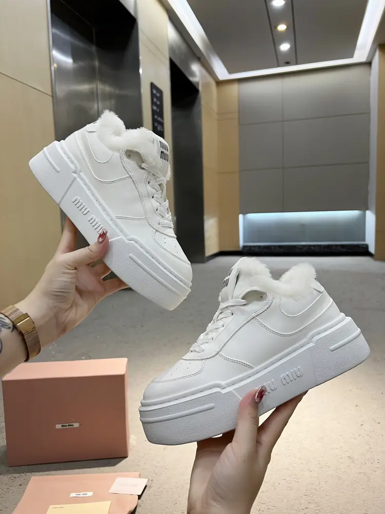 Miu Miu Miu women’s cowhide leather bleached and distressed sneakers
