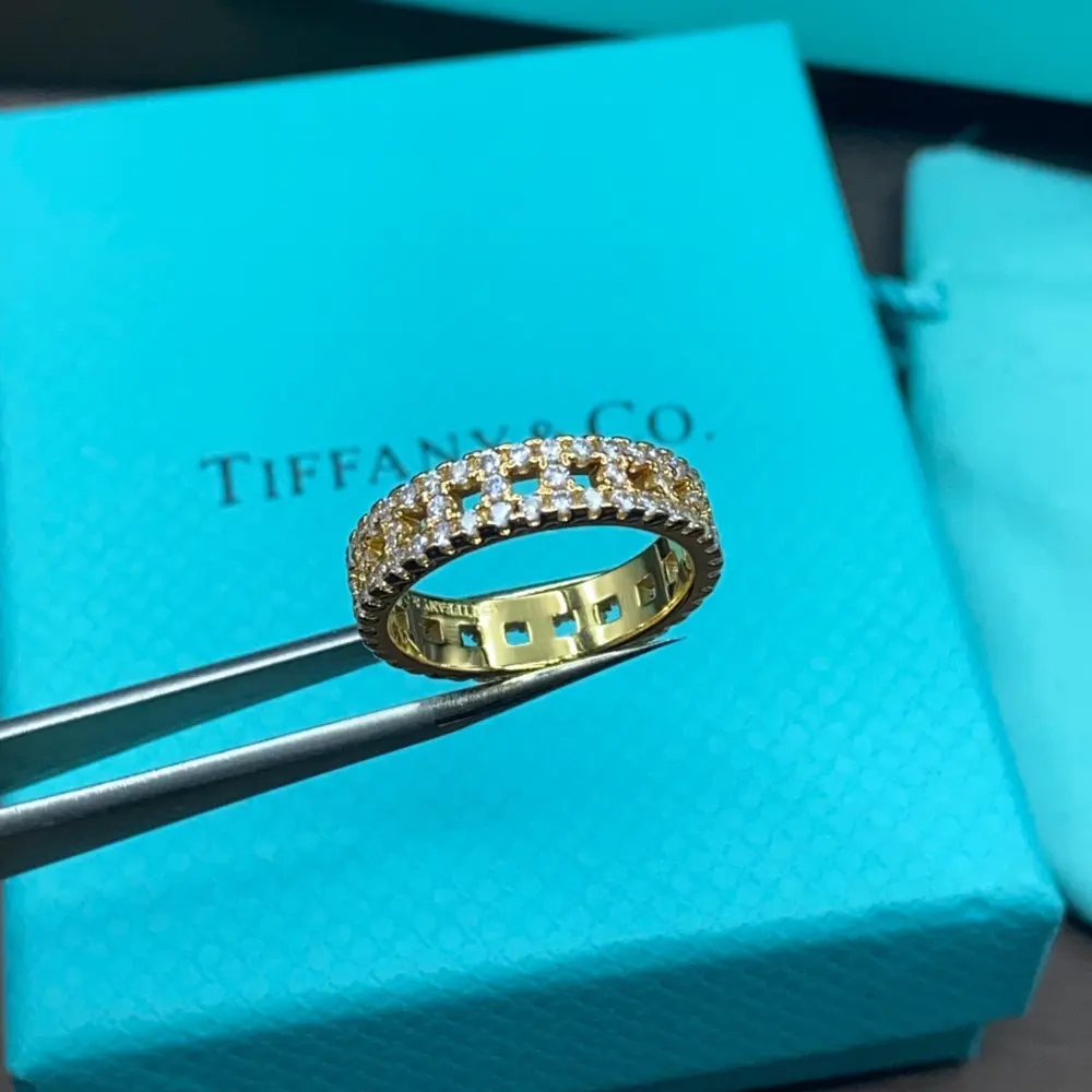 Tiffany full diamond hollow ring. Like a beacon guiding people towards optimism and hope