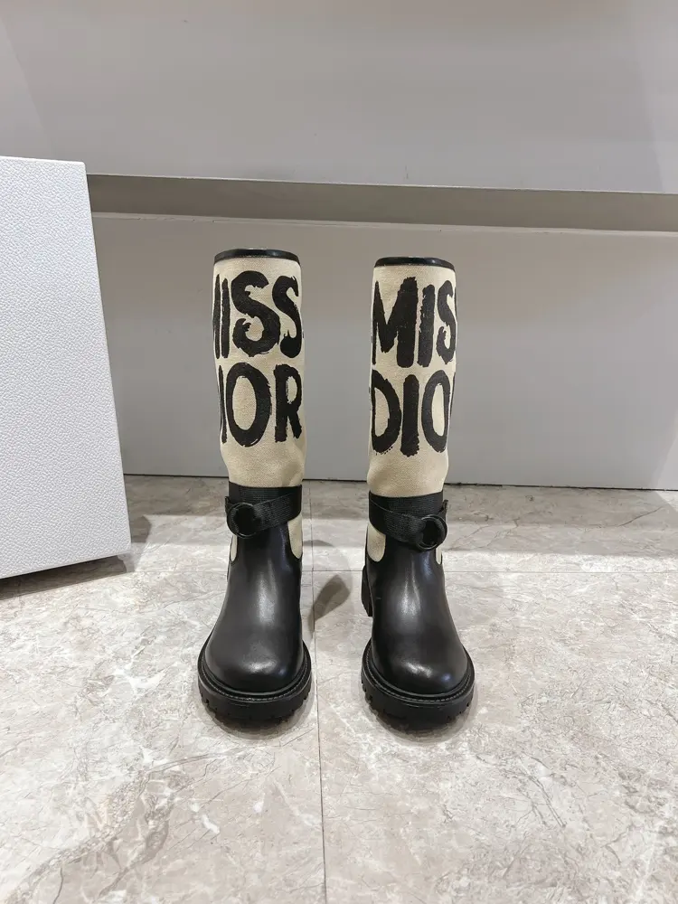 Dior-Major Graffiti Biker Boots Handsome boots with distinctive design elements for a