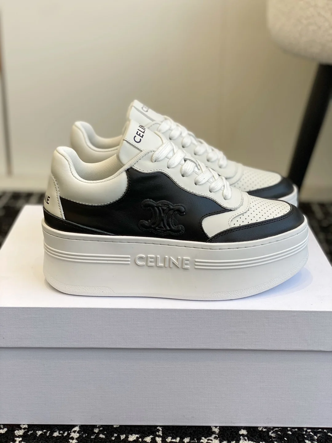 Celine thick-soled white shoes with CELINE logo embossed on the back and sides