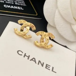 Chanel carved letter stud earrings