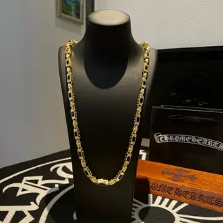 Chrome Hearts gold and black diamond necklace