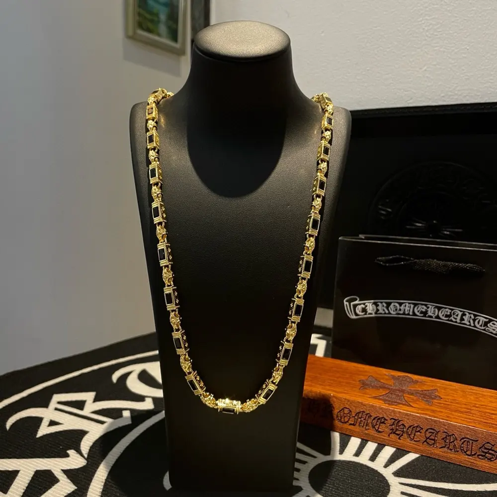 Chrome Hearts gold and black diamond necklace