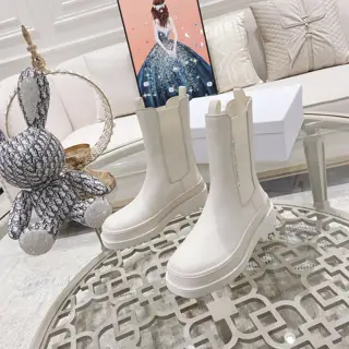 Dior’s Dior Trial ankle boots feature a Chelsea silhouette