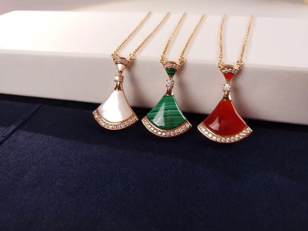 Bvlgari natural stone red agate fan necklace. 18K gold plated material