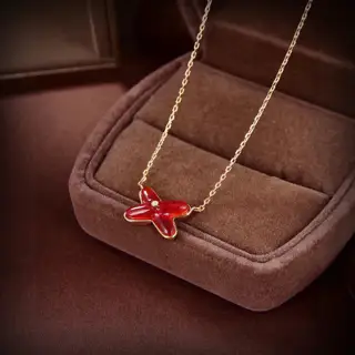 Chaumet cross onyx necklace