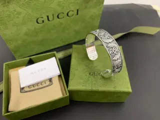 Gucci Double G distressed wings wide bracelet