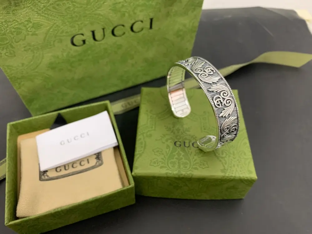 Gucci Double G distressed wings wide bracelet