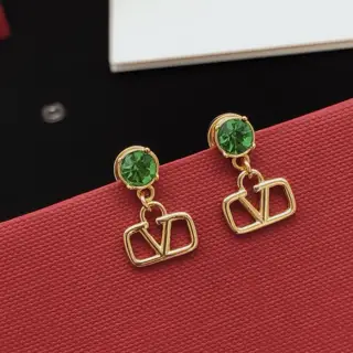 Valentino single diamond earrings with V-shaped hanging