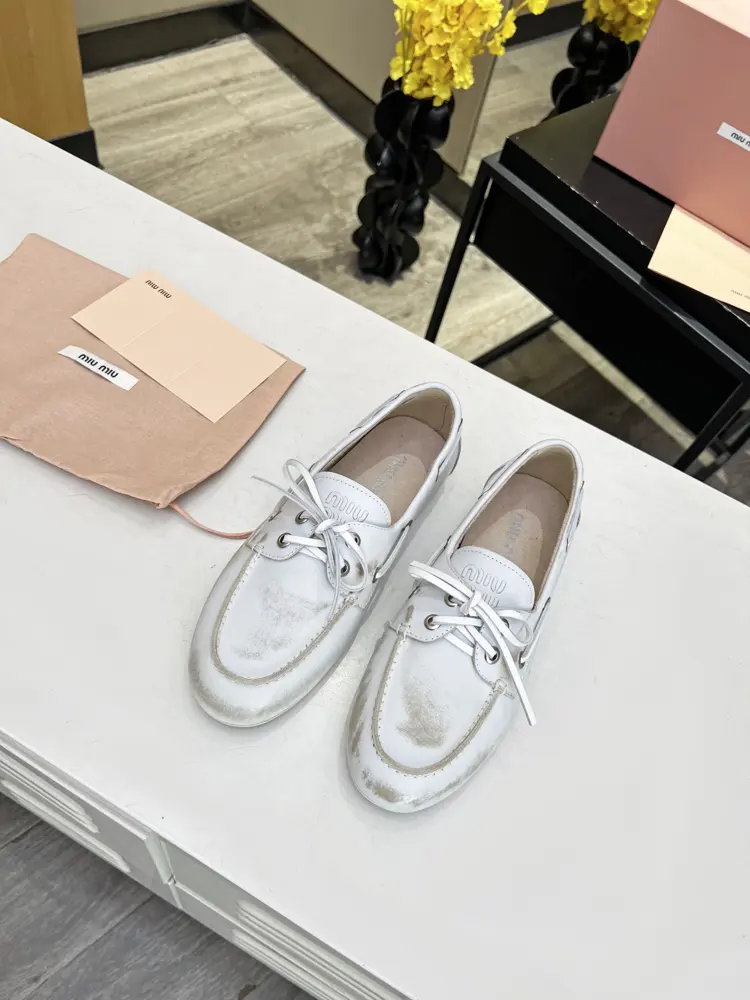 Miu Miu Miu’s rubbed retro loafers are hot