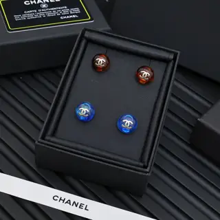 Chanel Tortoiseshell and blue button earrings