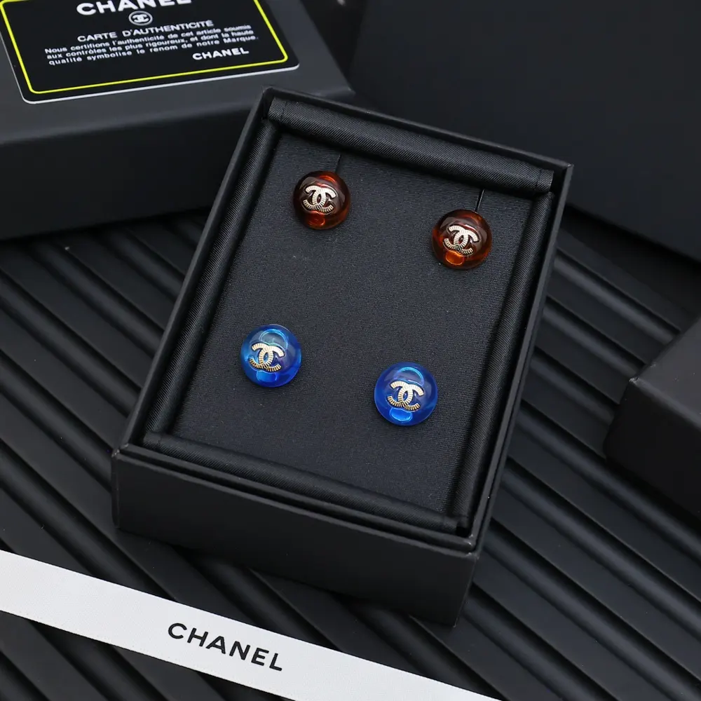 Chanel Tortoiseshell and blue button earrings