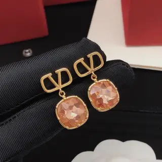 Valentino earrings and pendant with red diamonds