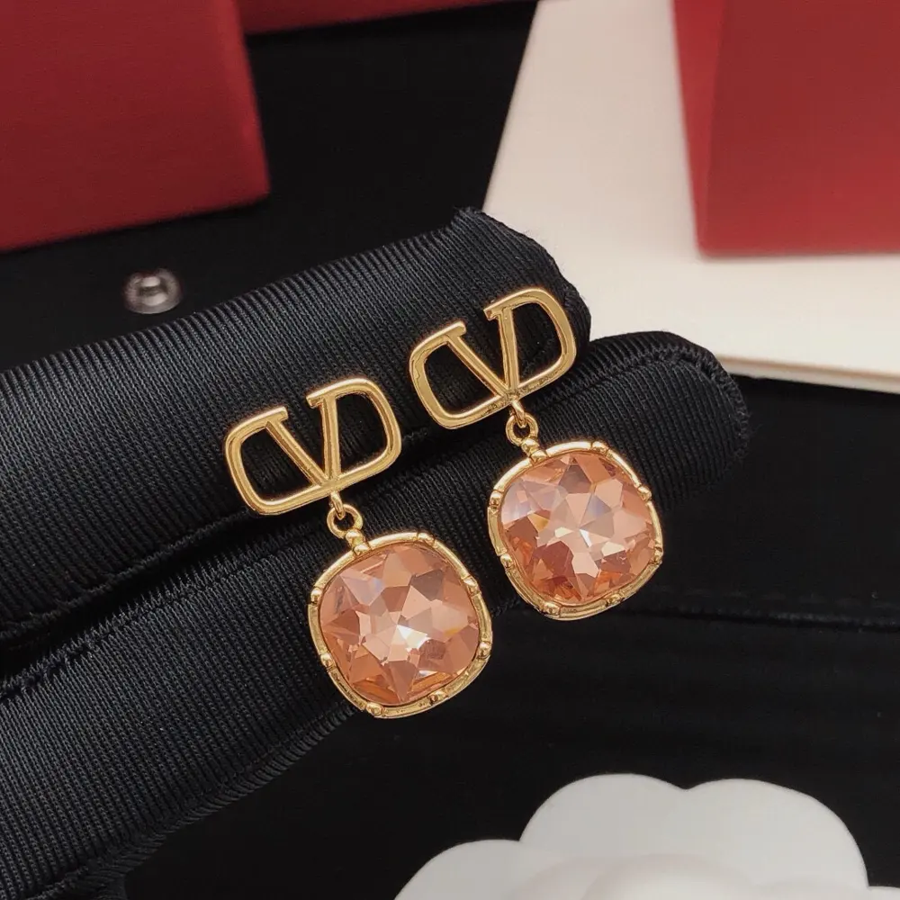 Valentino earrings and pendant with red diamonds