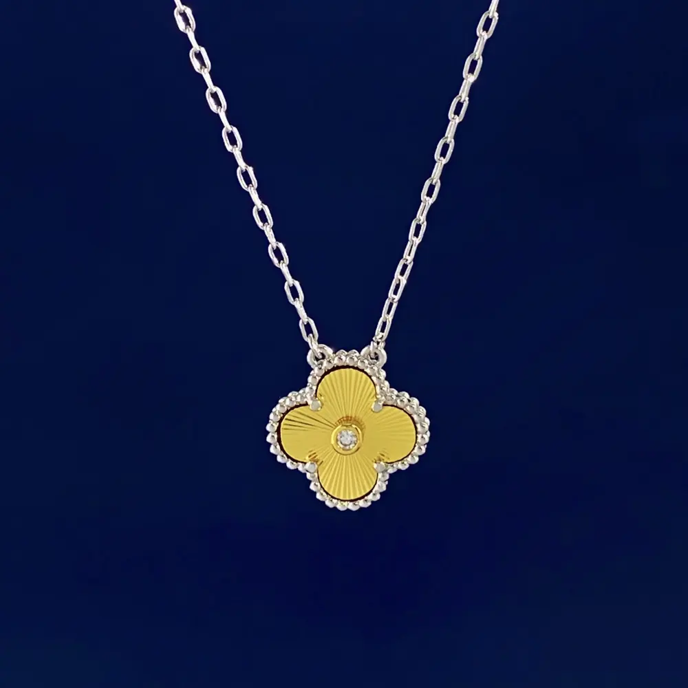 Van Cleef & Arpels two-tone lucky four-leaf clover pendant necklace
