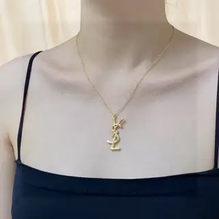 Yves Saint Laurent letter pendant antique gold necklace