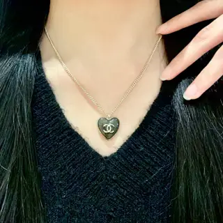 Chanel vintage letter necklace Chanel’s styles really need no introduction Each one is