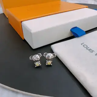 Louis Vuitton asymmetrical four-leaf clover earrings