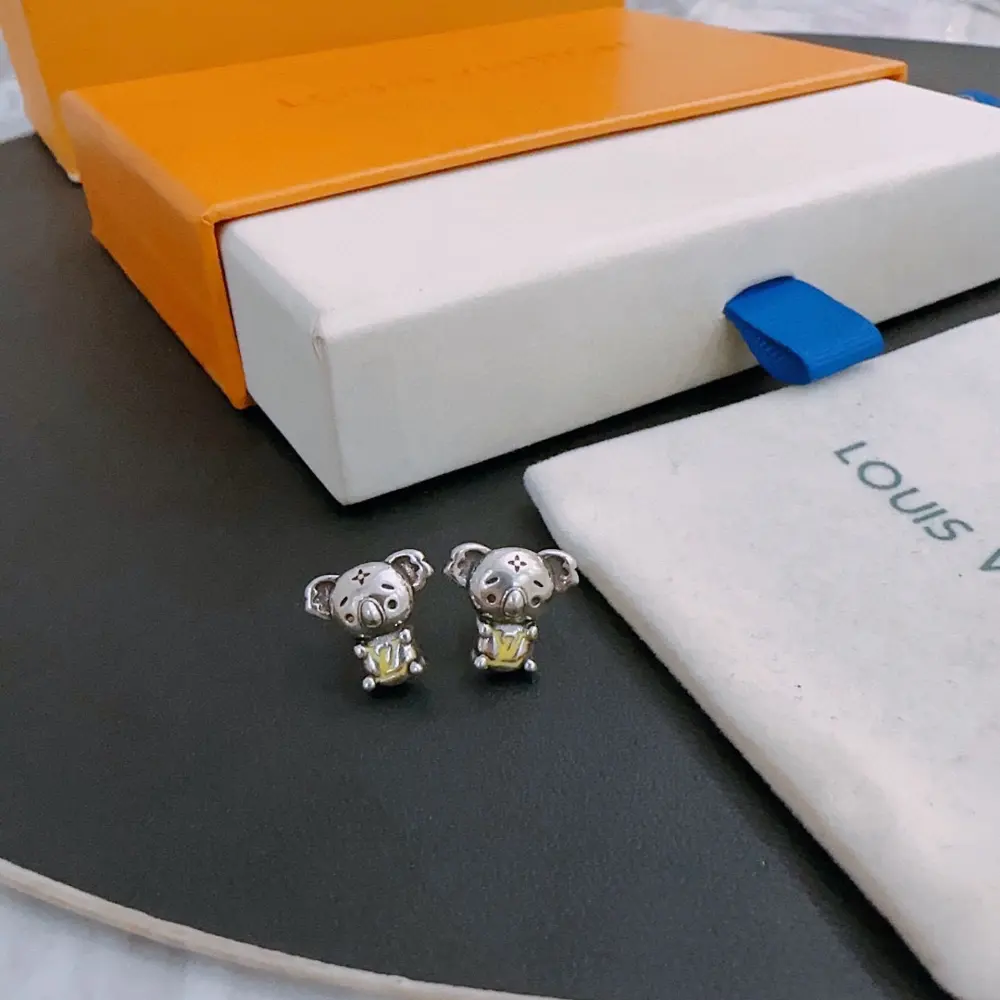 Louis Vuitton asymmetrical four-leaf clover earrings