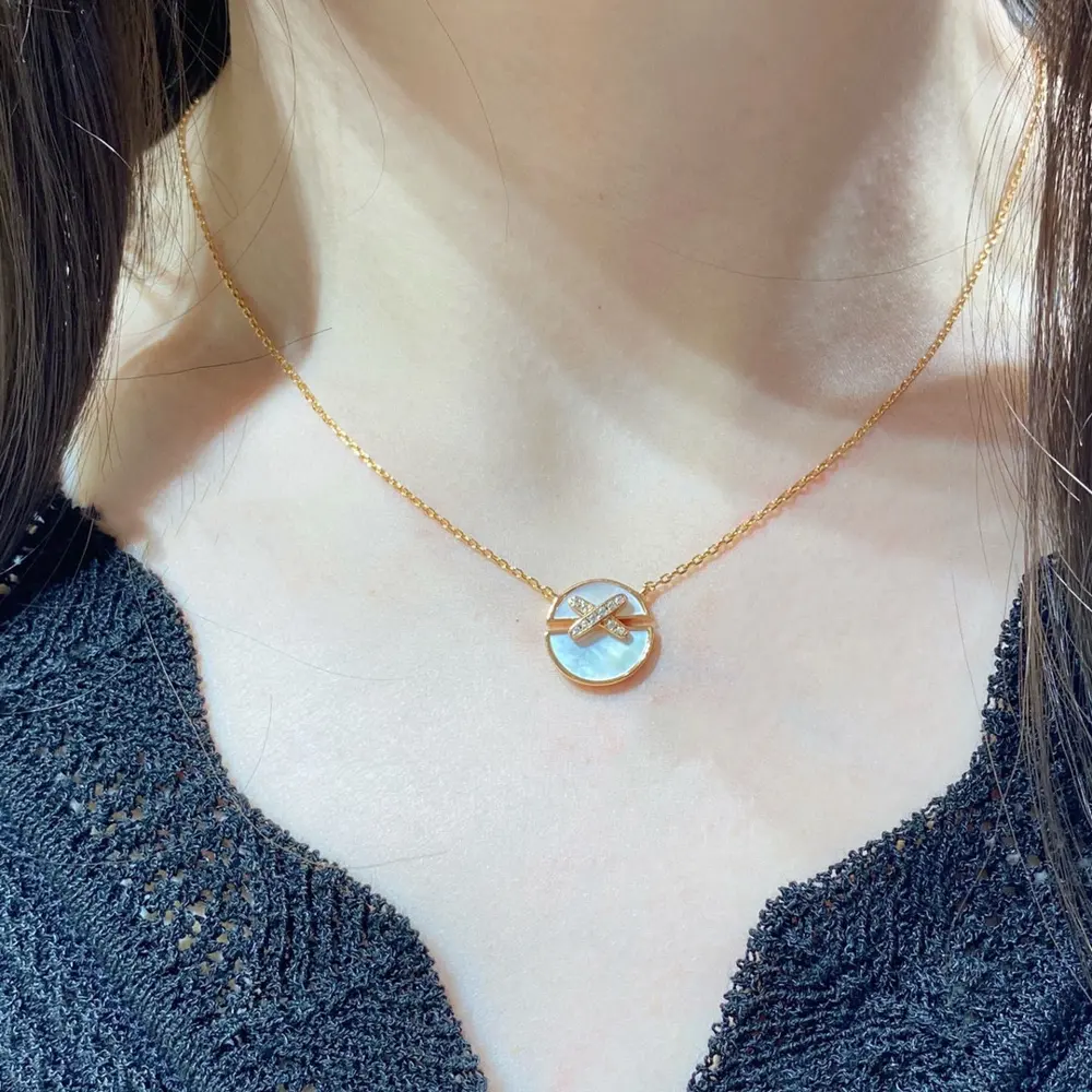 Chaumet cross round mother-of-pearl necklace