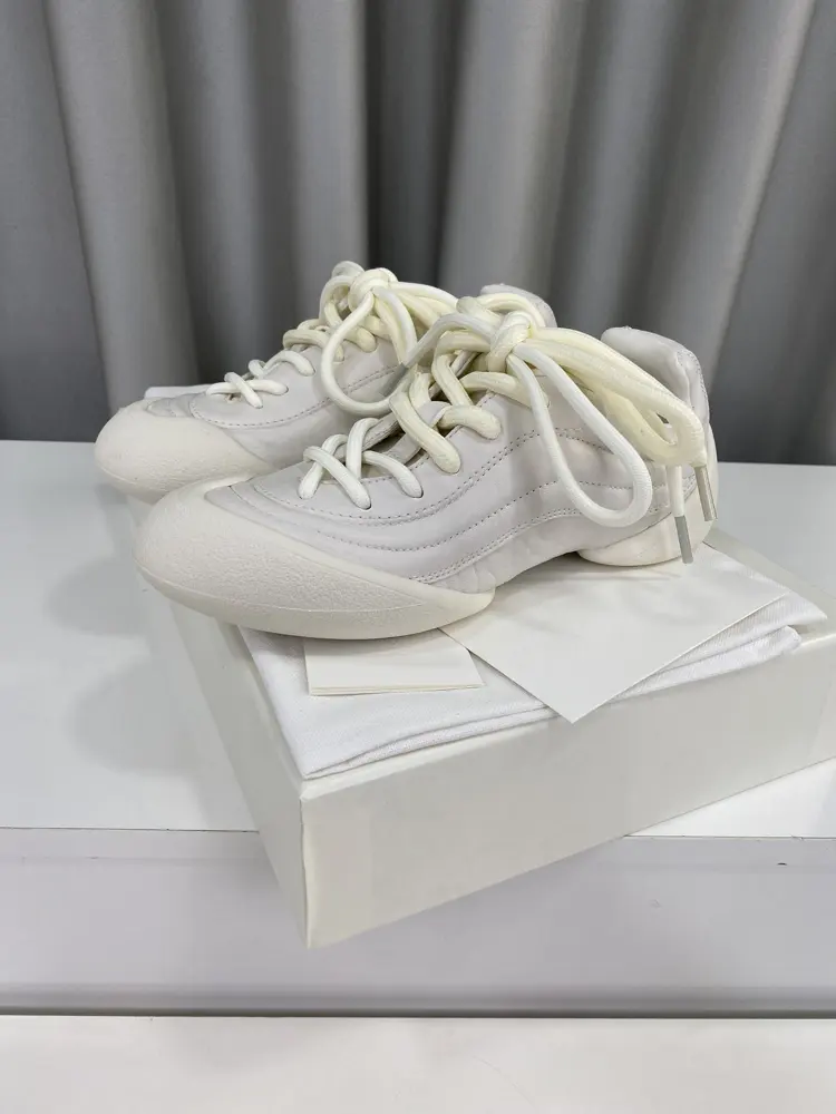 Alexander McQueen Flexion series couples retro casual sneakers