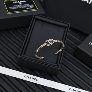 Chanel rhinestone twisted gold double C open bracelet