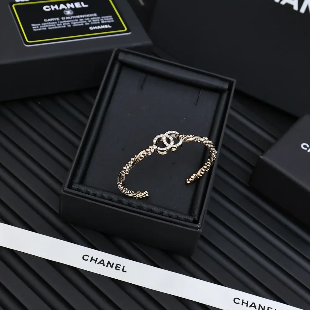 Chanel rhinestone twisted gold double C open bracelet