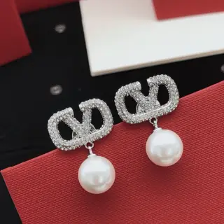 Valentino V-shaped silver diamond and pearl earrings