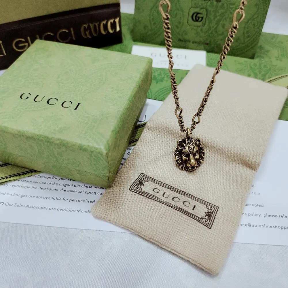 Gucci’s lion head design adorns this pendant necklace