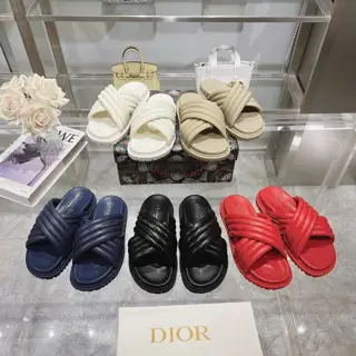 Dior Diorect slippers in cowhide leather feature a cross-effect rattan pattern for a modern