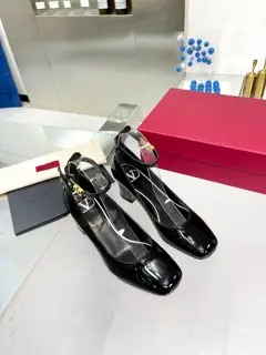 Valentino’s new patent leather version of the classic V-buckle sandals. New and upgraded