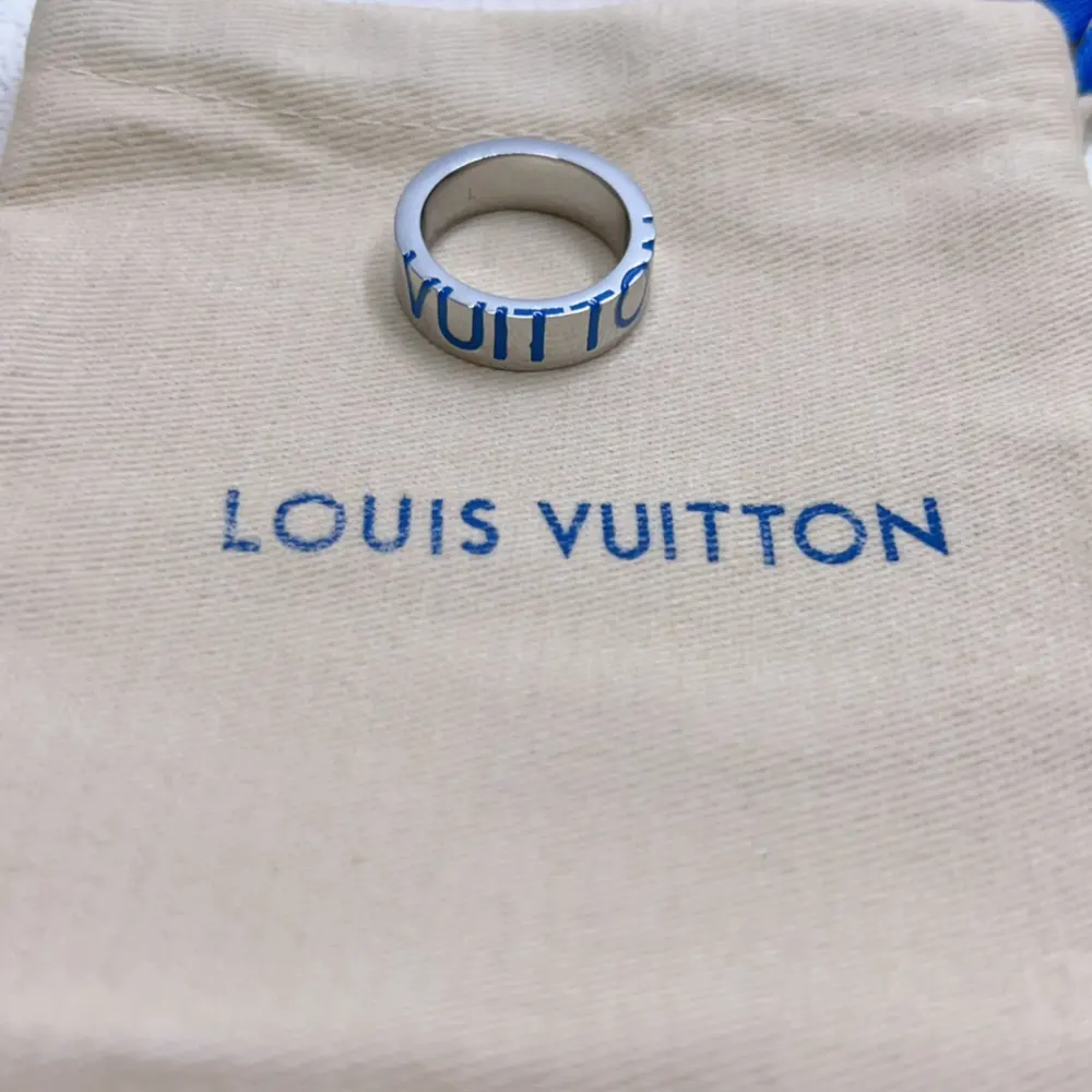 Louis Vuitton blue lettering logo ring