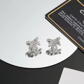 Chanel bow earrings