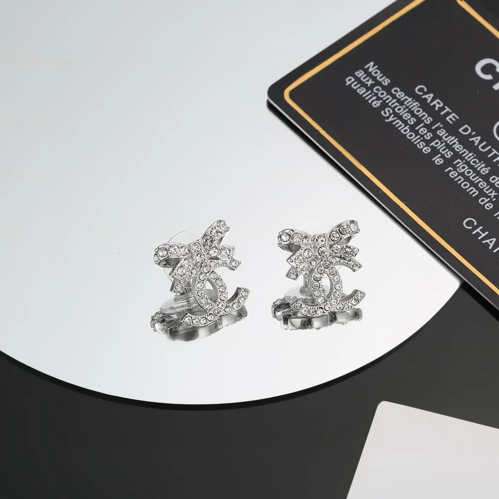 Chanel bow earrings