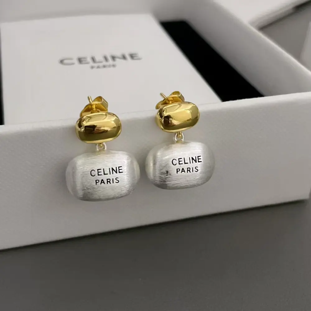 Celine hand-brushed double-bead letter earrings