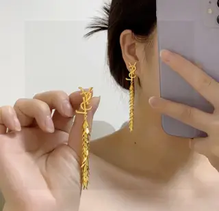 Yves Saint Laurent long tassel leaf earrings