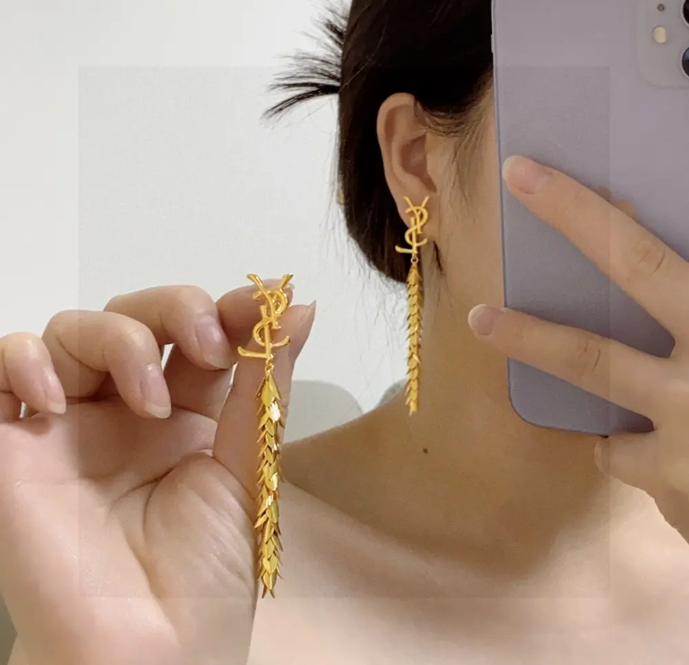 Yves Saint Laurent long tassel leaf earrings