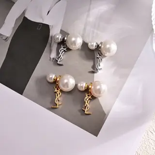 Yves Saint Laurent letter pearl earrings
