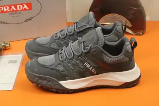 Prada sneakers are featured on the cover of Italian men’s shoes fashion magazine quarterly